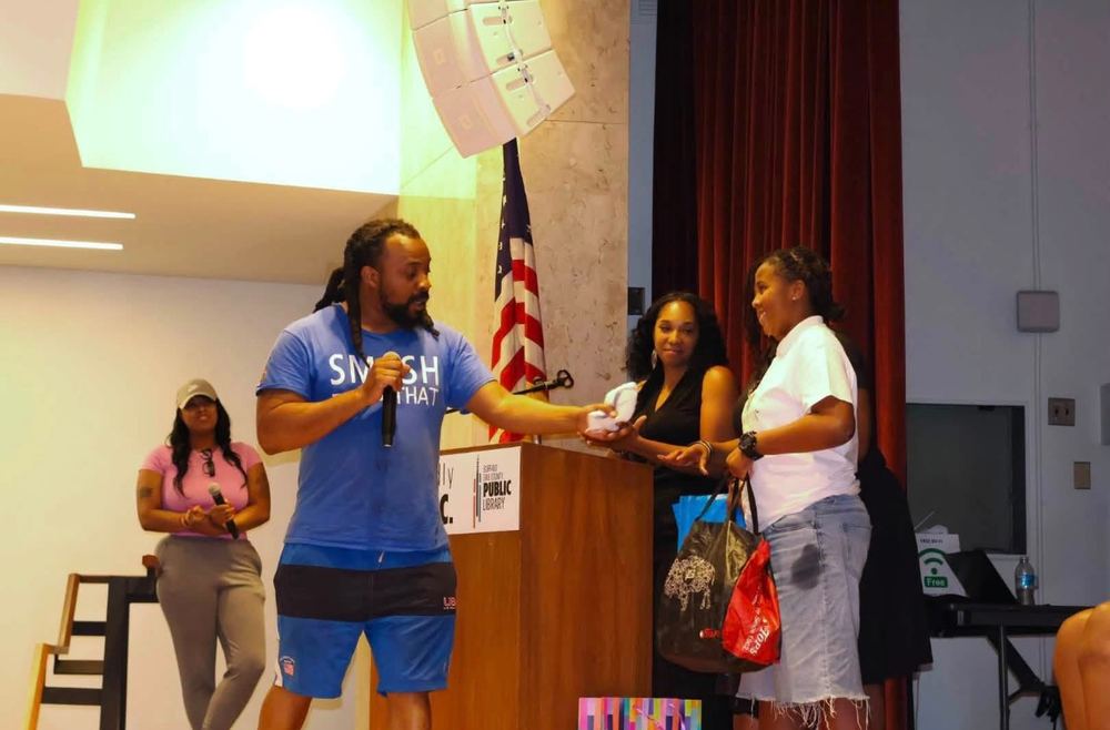 A student receiving an award on stage
